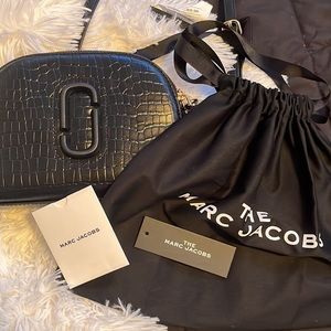 Marc Jacobs “The croc-embossed shutter crossbody bag”